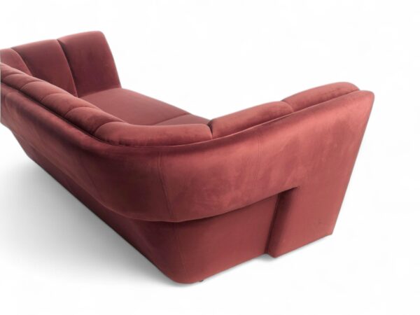 Luxurious velvet Italian sofa with tailored cushions and refined detailing