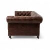 Vintage-style leather sofa with rolled arms