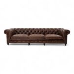Traditional leather Chesterfield sofa with aged patina