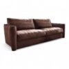 Classic leather designer sofa with rounded armrests and metallic accents