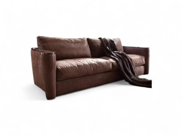 Contemporary leather sofa with stylish armrest details and plush seating
