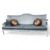 Elegant blue velvet 3-seater sofa with bronze round pillows