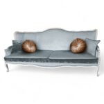 Elegant blue velvet 3-seater sofa with bronze round pillows