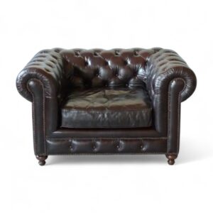 Chesterfield Leather Armchair with deep-button tufting and brass trim