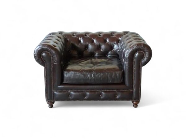 Chesterfield Leather Armchair with deep-button tufting and brass trim