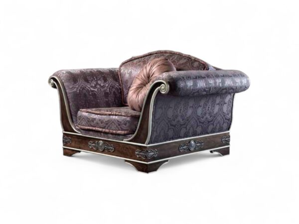 Elegant Art Deco sofa with decorative pillows and golden detailing