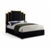 Art Deco inspired bed with bold geometric headboard in gold and black