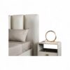 Modern bed in matte cream fabric with padded headboard