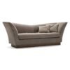 Modern sofa with flared armrests and cushions