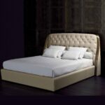 Button Upholstered Winged Bed