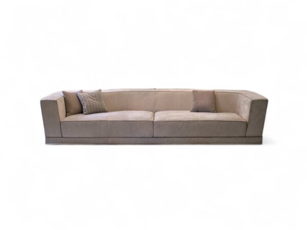The Aurelia Sofa with refined silhouette and quilted base detailing