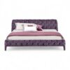 Velvet Twilight Bed with deep tufted violet velvet upholstery.