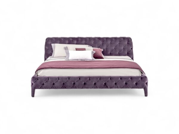Velvet Twilight Bed with deep tufted violet velvet upholstery.