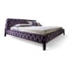 Statement bed in rich velvet with fully tufted headboard and base.