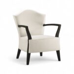 Snowveil Chair with ivory upholstery and dark wood arms