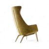 High-back velvet armchair with tapered wooden legs in Art Deco style