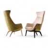 Art Deco accent chair with ergonomic design and wood base