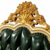 Regal green leather bed with detailed woodwork and tufting