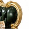 Regal green leather bed with detailed woodwork and tufting