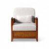 Handwoven cane armchair with upholstered seating