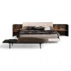 Luxury Riviera Bed with plush headboard and elegant wooden detailing