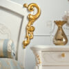 Hand-carved luxury ivory and gold leaf bed in European style