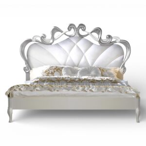 Pearl and Silver Carved Bed with tufted pearl upholstery and sculpted frame