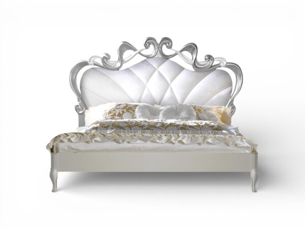 Pearl and Silver Carved Bed with tufted pearl upholstery and sculpted frame