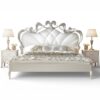 Luxury bed in pearl fabric with ornate silver carving details