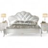 Luxurious ivory upholstered bed for a sophisticated bedroom
