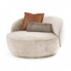 Rounded velvet lounge chair with matching scatter cushions