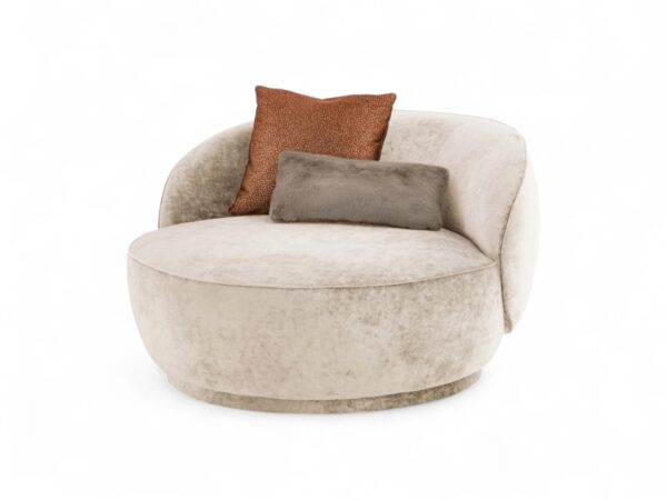 Rounded velvet lounge chair with matching scatter cushions