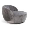 Blush pink velvet swivel chair with circular design