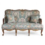 Luxury Louis XV Style Carved Sofa with floral upholstery and carved frame