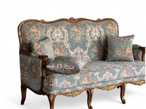 Elegant French Rococo three-seater sofa with gilded wood detailing