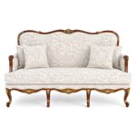 Luxury Louis XV Style Carved Sofa with floral upholstery and carved frame