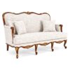Antique-style Louis XV carved sofa with plush cushions and ornate frame