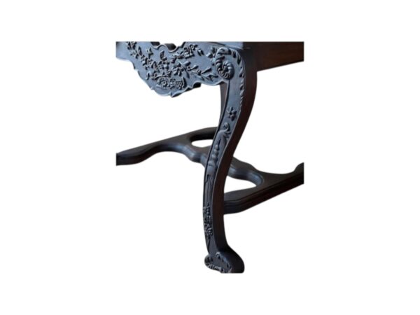 Elegant Noir Crest Chair with hand-carved wooden frame