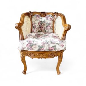 Rococo Armchair with carved wood frame and floral fabric