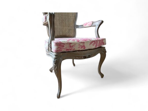 French Rococo-style chair with toile fabric upholstery