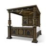 Black and gold Victorian bed with hand-carved detailing