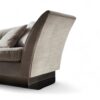 Modern three-seater sofa with flared armrests and cushions