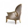 Luxurious velvet chair with gold leaf accents and plush design