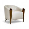 Modern ivory barrel chair with floral wood accents