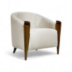 Modern ivory barrel chair with floral wood accents