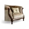 Italian luxury armchair with elegant sculptural detailing