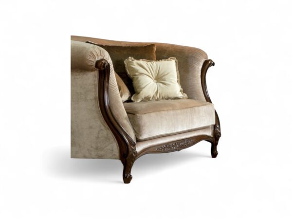 Italian luxury armchair with elegant sculptural detailing
