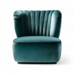 Celestial Bloom Armchair with fluted back and teal velvet upholstery