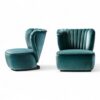 Fluted teal armchair with plush seating and hardwood frame