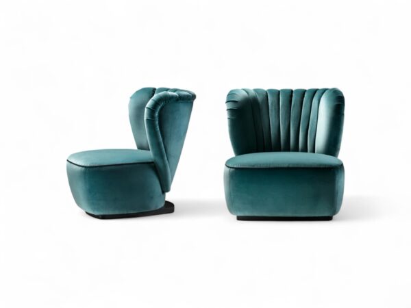 Fluted teal armchair with plush seating and hardwood frame